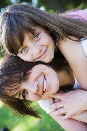 Mother and daughter in parkの写真素材