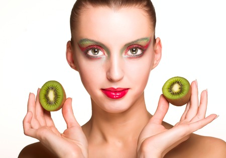 woman with kiwiの写真素材