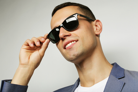 Handsome in style. Cheerful young man in smart casual wearの写真素材