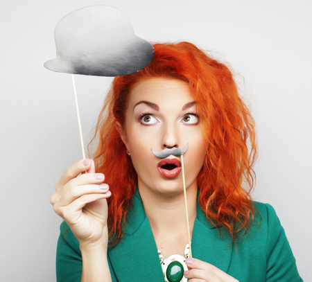 Attractive playful young woman ready for partyの写真素材