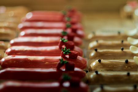 Cake and pastry in window display canteen food dessert tastyの写真素材