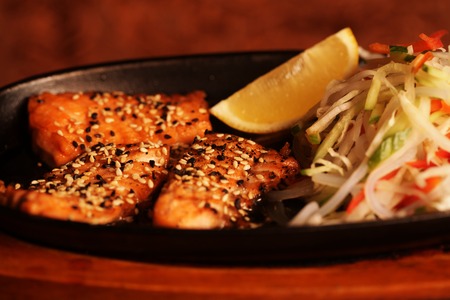 Grilled Salmon with fresh saladの写真素材