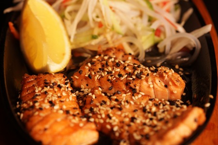 Grilled Salmon with fresh saladの写真素材