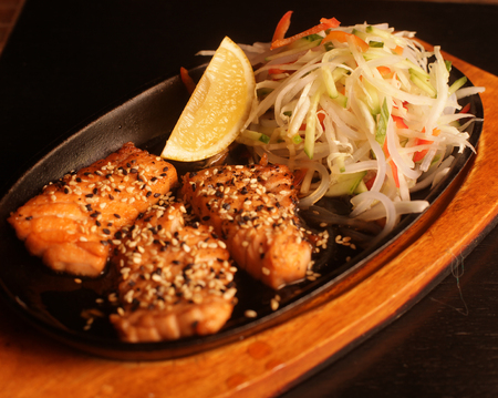 Grilled Salmon with fresh saladの写真素材