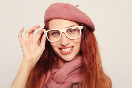 Portrait of stunning blond student, studio. Lifestyle and people concept.の写真素材