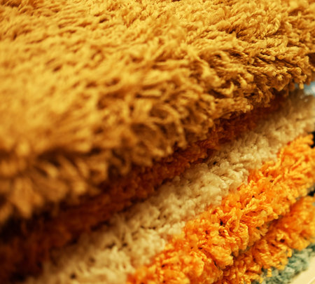 Sale! Assortment of different carpets in store.Close up.の写真素材