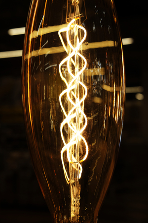 Ceiling lamps on dark background in storeの写真素材