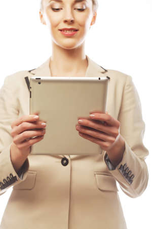 business woman uses a mobile tablet computerの写真素材