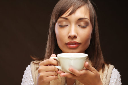 Beautiful woman drinking coffee