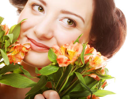 woman fith bright pink-yellow flowersの写真素材
