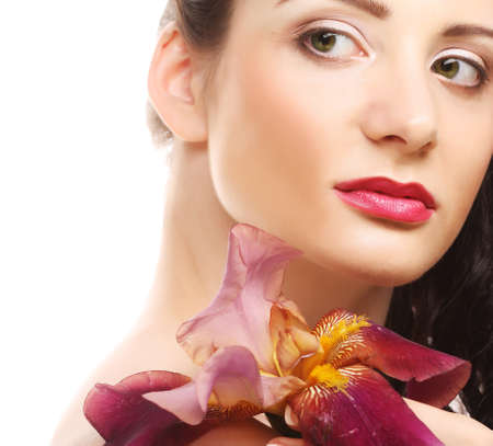 beautiful woman with pink flowerの写真素材