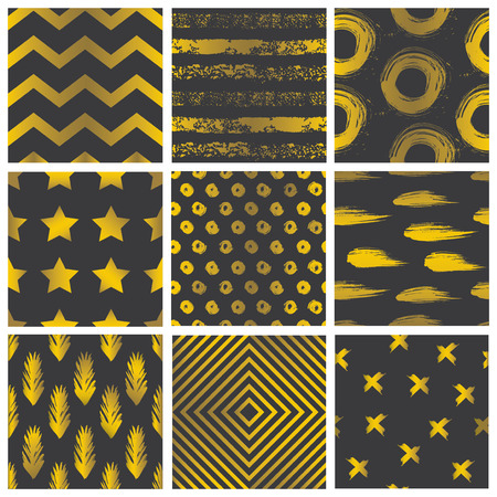 Set of spectacular patterns with gold hand drawn elements on black background.のイラスト素材