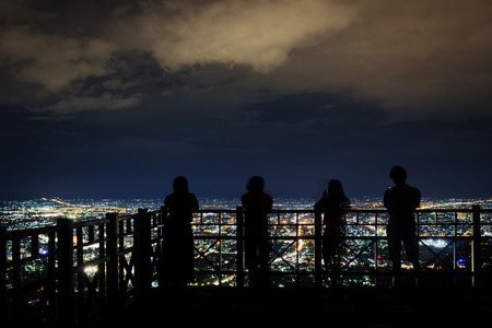 Blurred tourists and city lights;の写真素材