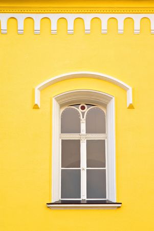 window and details of white - yellow facadeの写真素材