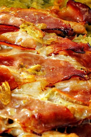 baked prosciutto with herbs, detail, verticalの写真素材