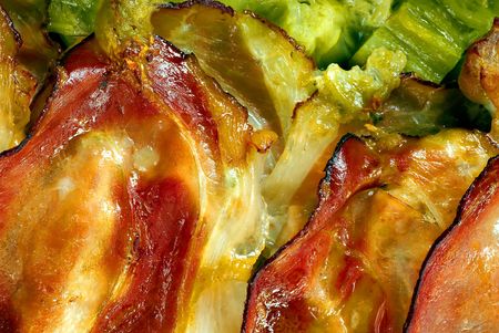 Baked prosciutto with green herbs detailの写真素材