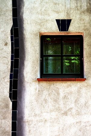 Detail of a window in modern organic facade verticalの写真素材