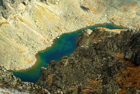 Mountain lake from the top with view under surfaceの写真素材