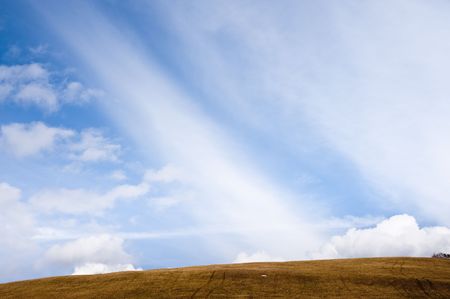 Horizon with hill and cloudsの写真素材
