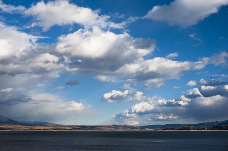 Lake with clouds on the skyの写真素材
