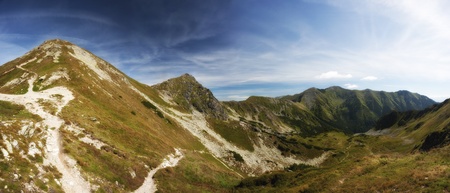 Panorama of mountains in summer sunny dayの写真素材