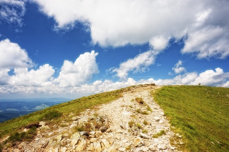 Mountain in summer day with cloudy skyの写真素材