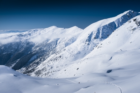 Mountains winter scenery in white and blueの写真素材