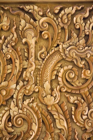 Carved wood thai templeの写真素材