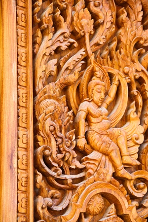 Carved wood thai templeの写真素材
