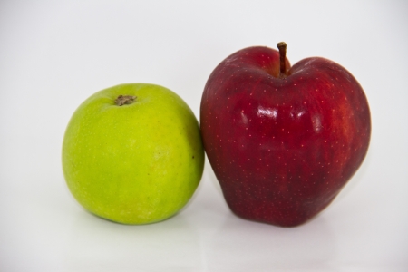 Green and red appleの写真素材