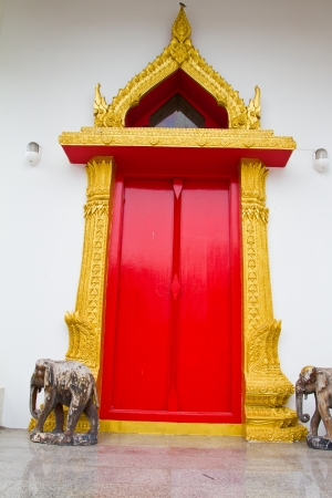 Thai temple red doorの写真素材