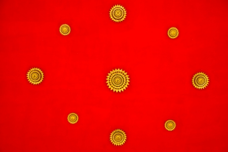 The art on red ceiling in thai temple, Thailandの写真素材