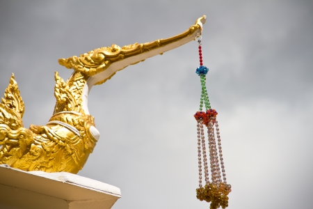 golden swan in thai templeの写真素材