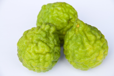 Kaffir limes on white background の写真素材