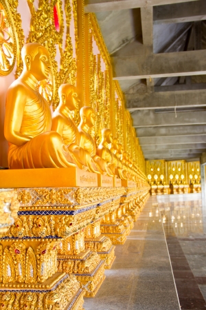 row of gold monk statueのeditorial素材