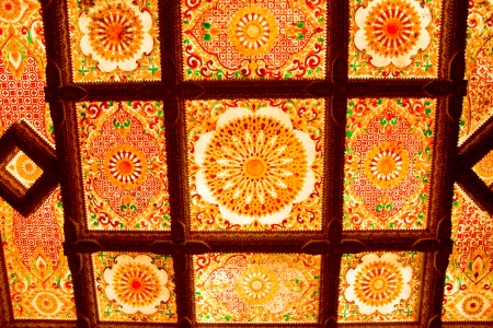 Thai art decorative ceiling at the temple of Thailand のeditorial素材