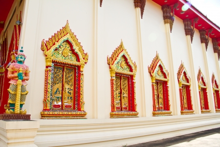 Style art on window of thai temple, Wat Liab, Ubonratchathani , Thailandの写真素材