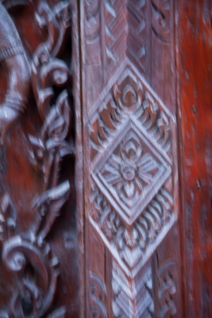 Thai style carving wood at thai templeの写真素材