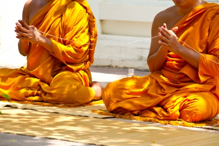 monks and religious rituals in thai templeの写真素材