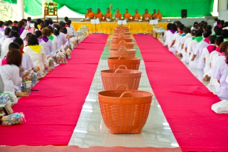 Thai peoples give food for thai monk in thai templeのeditorial素材