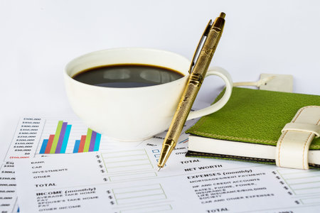 Business report and a cup coffee