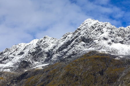 Snow mountains along Milford Sound road New Zealandの写真素材