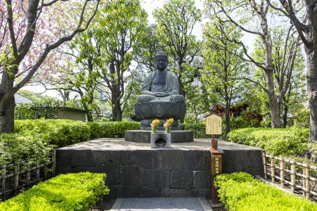 Buddha statue in the garden of Asakusa temple areaのeditorial素材