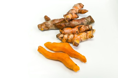 Fresh turmeric root isolated on white backgroundの写真素材