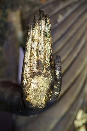 Hand of Budha in thai templeの写真素材