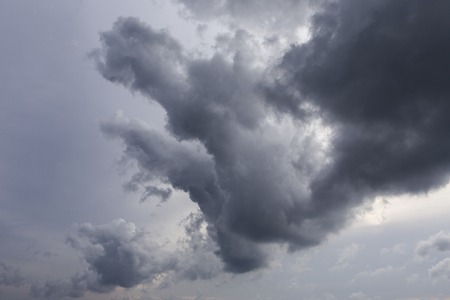 dark storm clouds before rainの写真素材