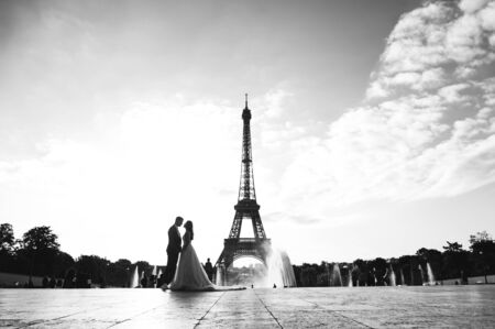 Happy bride and groom enjoying their wedding in Parisの写真素材