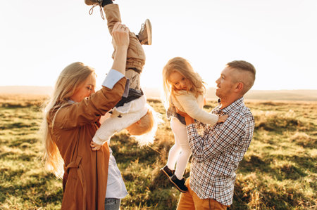 A portrait of a happy family which are playing