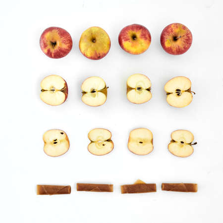 Flat lay of various dried and fresh fruits on a white background. Fruits, pastilles and fruit chips in creative background.の写真素材