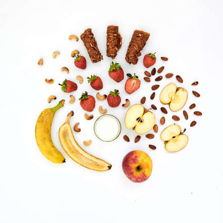 Composition of ingredients for making fruit chips and pastilles on a white table.の写真素材